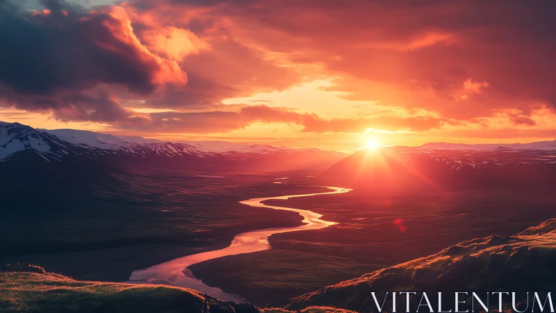 Warm river valley sunset glowing beneath gentle clouds.