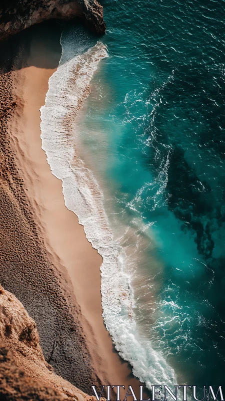 Waves break diagonally along steep sandy and rocky shoreline