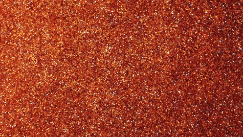 Copper orange glitter texture with dense metallic sparkle.