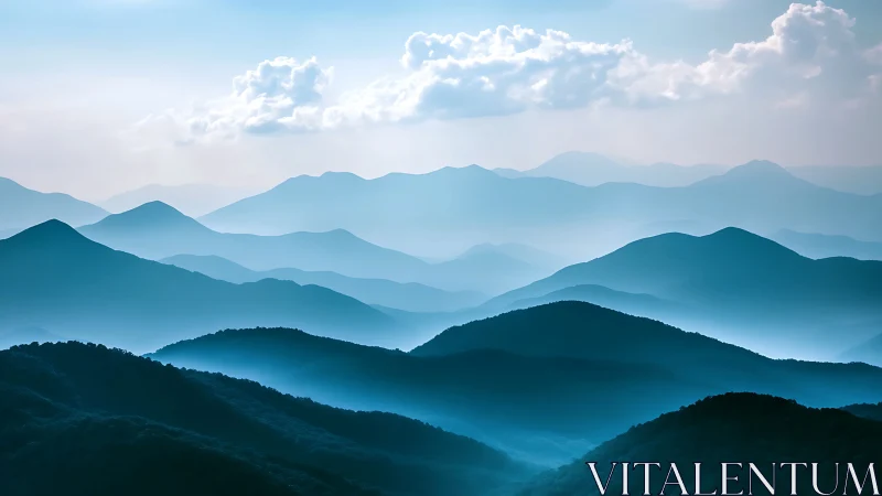 Gentle blue mountains fading into a dreamy, peaceful horizon.