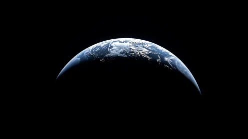 Curved Earth horizon is shown partially illuminated in space