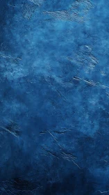Deep sapphire stone texture with subtle weathered veins.