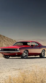 Classic red muscle car stands bold against desert horizon