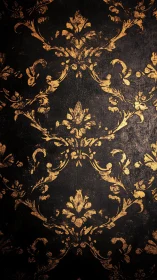 Baroque gold damask ornament on distressed black wall