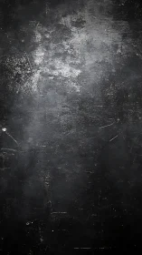 Weathered black concrete texture with scratches and patina