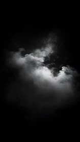Soft white smoke drifts gently through a quiet dark sky