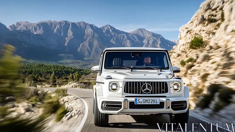 High-performance Mercedes SUV tracked head-on on winding mountain road
