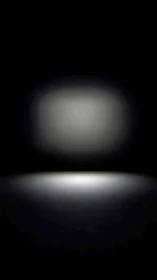 Elliptical spotlight beam over reflective black studio floor
