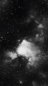 Nebula halo blooms in monochrome starlit deep-space hush.