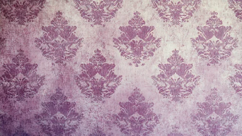 Vintage pink damask wallpaper texture with faded pattern.
