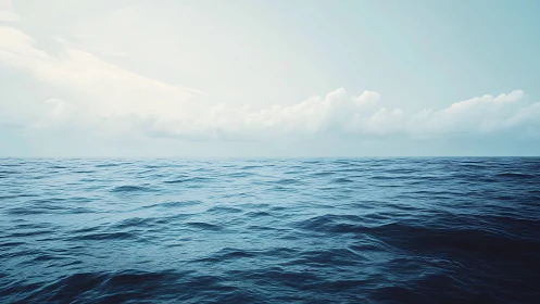Endless Azure Drift beneath a Cloud-Soft Horizonline.