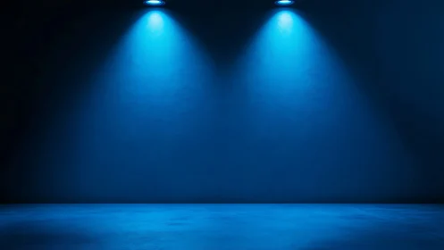Empty dark interior wall with two overhead blue spotlights.