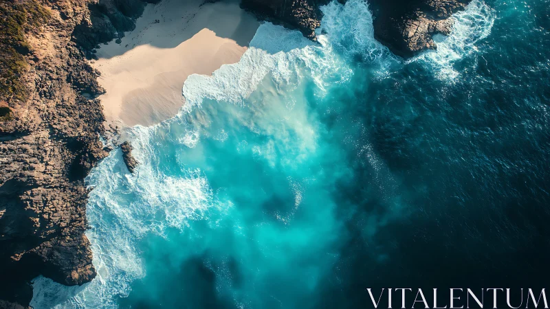 Rocky coastline with turquoise surf and hidden sand cove.