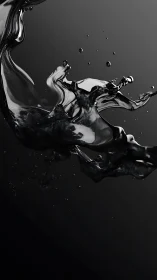 Liquid black splash suspended in high-contrast motion study.