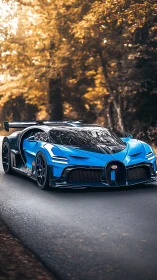 Electric-blue hypercar prowls through autumn-tinted forest