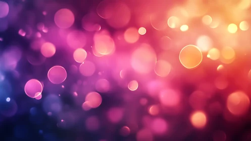 Vibrant Bokeh Light Background with Pink, Purple, and Gold Hues.