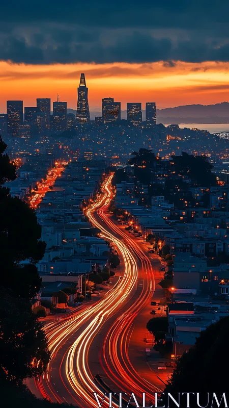 City skyline at dusk with winding highway light trails.
