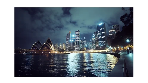 Sydney harbor skyline glows against dramatic cloudy night sky