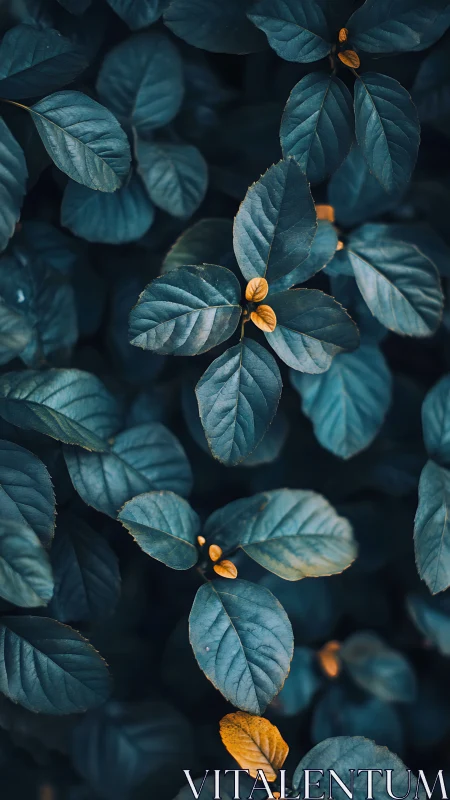 Moody teal foliage with accented ochre leaves, vertical crop.
