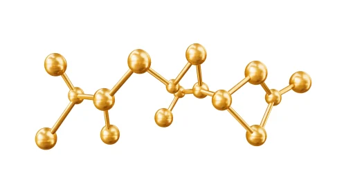 Golden metallic molecule structure illustration in 3D render style.