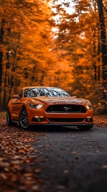 Orange sports car glows against vivid autumn forest road.
