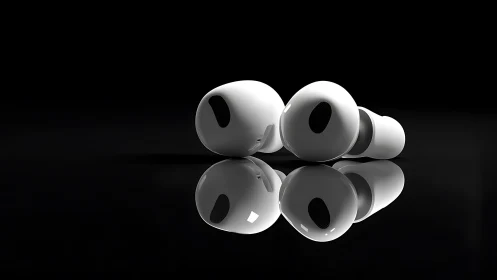 Wireless white earbuds with reflective black surface view.