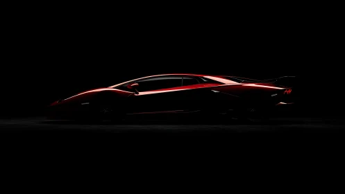 Low key side-profile study of red supercar silhouette lighting.