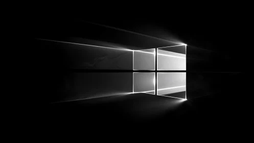 Soft light window beams cutting through deep black space.