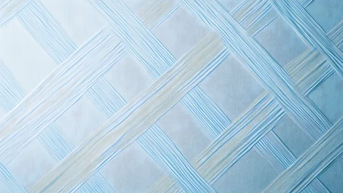 Blue woven geometric pattern with textured diagonal bands.