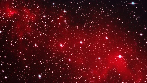 Nebula sparks shimmer like ruby dust scattered in night