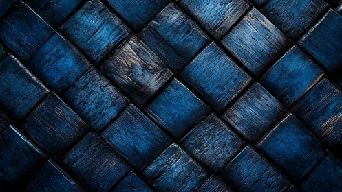 Diagonal blue wooden tiles form a textured geometric grid