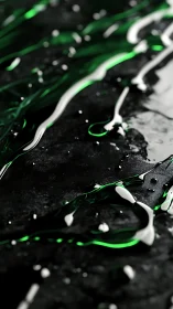 Green and white liquid streaks flow over dark wet surface