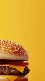 Close-up cheeseburger with sesame bun on yellow background.