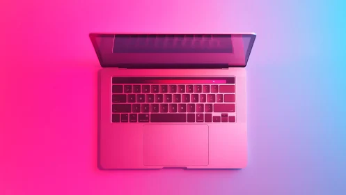 Partially open laptop computer is viewed from directly above