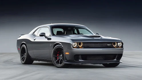 Muscle coupe stands poised with aggressive stance and lights.