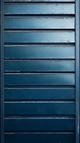 Midnight blue metal slats with quiet urban character.