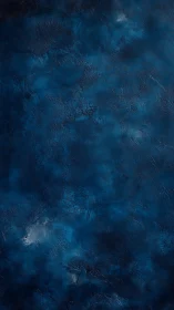 Midnight indigo textured background with subtle clouded depth.