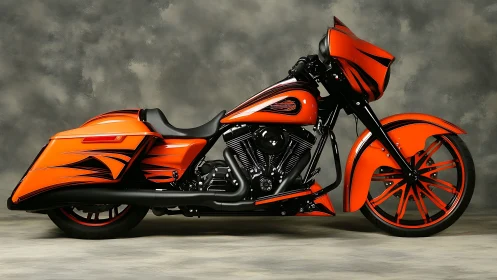 Custom orange cruiser motorcycle glowing with streetwise style.