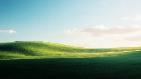 Sunlit green hills roll gently beneath a calm open sky