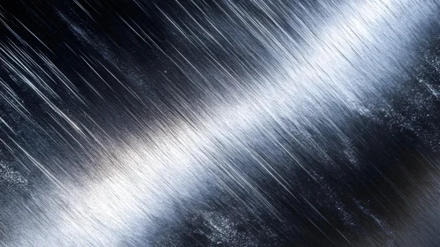 Abstract brushed metal texture with diagonal light streaks.
