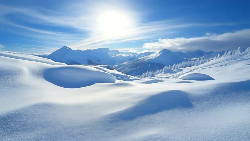 Sunlit winter waves rolling across quiet mountain snowfields.