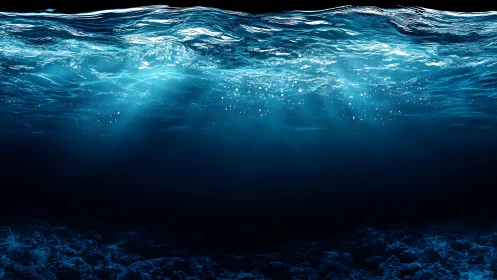 Subsurface ocean layer with caustic light rays and dark seabed