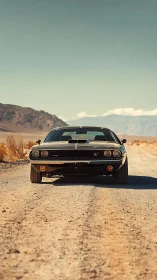 Photorealistic front-view muscle car on desert gravel road.