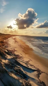 Low-angle sunset illuminating eroded coastal dune and tidal shoreline