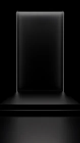 Minimal black product pedestal with soft edge lighting.