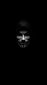 Guy Fawkes mask centered in darkness with hooded figure