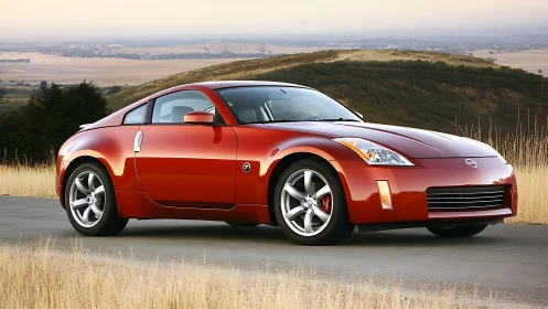 Red Nissan sports coupe gleams on a quiet country roadside