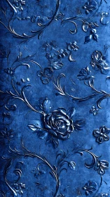 Embossed blue floral pattern shows metallic rose relief