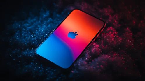 iPhone with gradient display emitting blue and red particle effects.