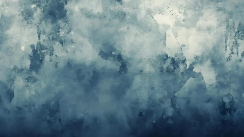 Abstract blue watercolor texture with cloudy, dreamy atmosphere.